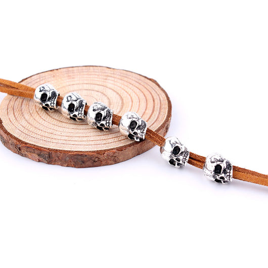 Red velvet rope with six silver-colored skull beads, ideal for DIY hair accessories or crafting projects. - Image 6