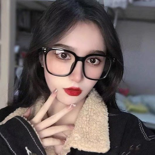 Full-frame trendy blue light blocking glasses with a transparent blue square frame and clear lenses. - Image 20