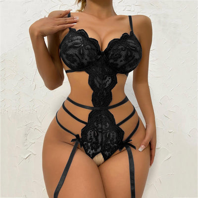 White lace transparent bodysuit featuring a scalloped bra, intricate floral lace, and strappy garter details with bows. - Image 12
