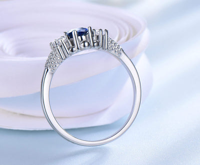 Anillo de Plata Esterlina con Zafiro Azul Real y Halo de Gemas - Image 10