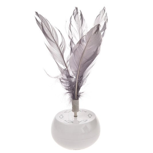 White pet tumbler cat toy with grey feathers on top and fish patterns on the spherical base.