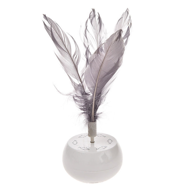 White pet tumbler cat toy with grey feathers on top and fish patterns on the spherical base.