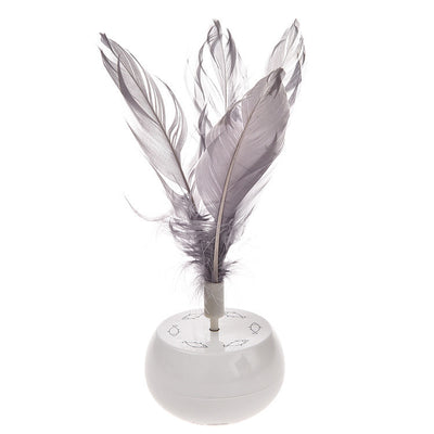 White pet tumbler cat toy with grey feathers on top and fish patterns on the spherical base.