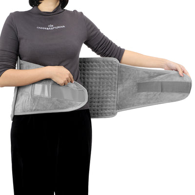 Gray quilted waist heating belt with an adjustable strap, wired remote control, and power plug, shown with its box. - Image 17