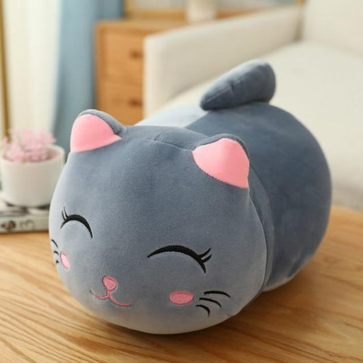 Cute orange cat plush doll with pink ears, black eyes, and embroidered whiskers, resting on a white book. - Image 12