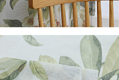 Dark gray semi-sheer curtains with a white and green floral pattern, hung on a black rod in a living room. - Image 20