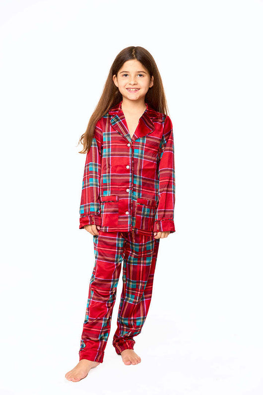 Young girl in a leopard print pajama set with black feather trim on the cuffs and ankles, wearing a pink glitter headband. - Image 9