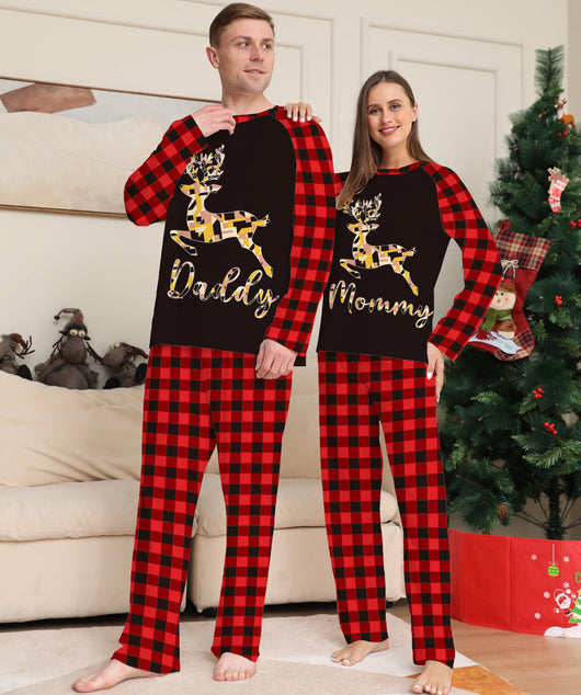 Kids' black and red buffalo plaid pajamas with a colorful deer graphic and "Kids" text on the top. - Image 2