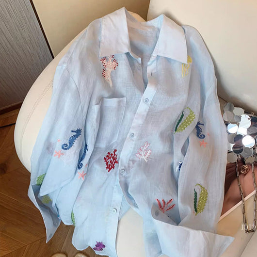 Blusa de Protección Solar con Bordado Floral para Mujer