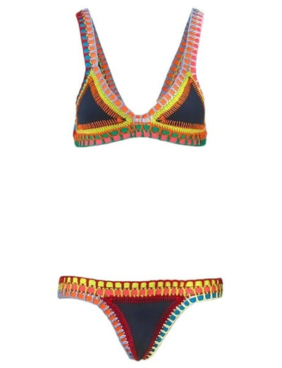 Pink crocheted bikini with silver knitted stitching, featuring a triangle top and matching bottom, laid flat. - Image 6