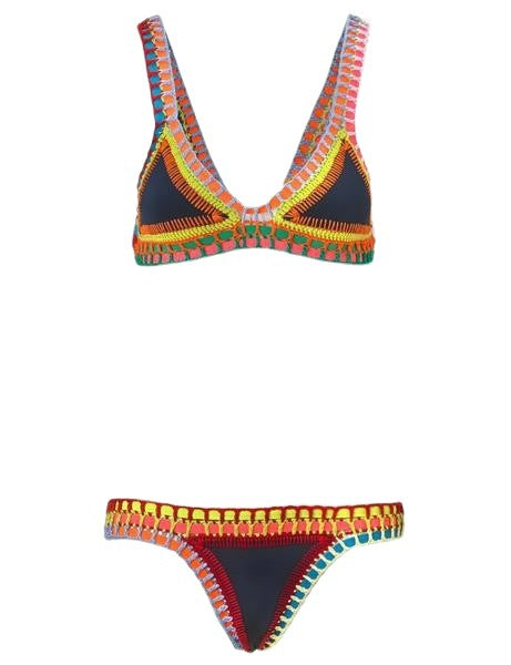 Pink crocheted bikini with silver knitted stitching, featuring a triangle top and matching bottom, laid flat. - Image 6