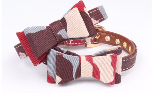 Two pet collars with blue, white, and tan camouflage bowknots and brown lining on a white background. - Image 7
