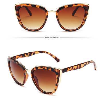 Ladies retro cat eye sunglasses with a tortoiseshell frame, gold accents, and brown gradient lenses. - Image 17
