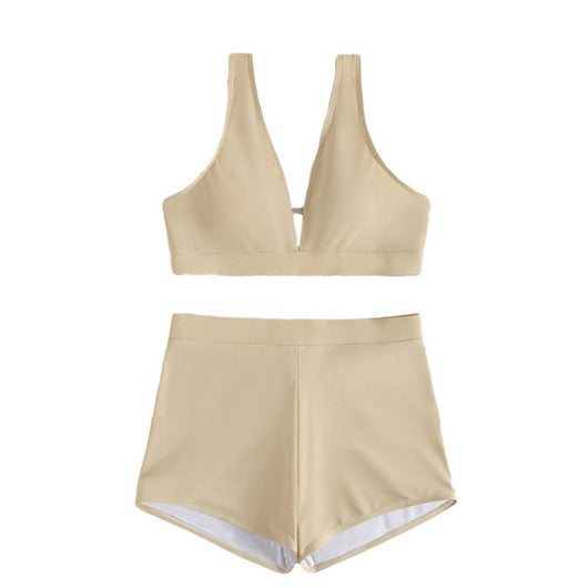 Women's deep-V Halong Bay-style two-piece swimsuit in light beige, featuring a crop top and high-waisted shorts. - Image 5