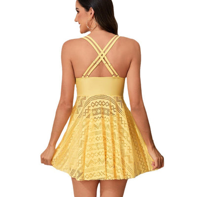 Yellow two-piece swimsuit with a ruched V-neck top and a patterned A-line swim skirt, modeled by a woman. - Image 5