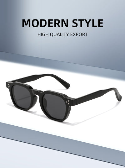 Black square frame sunglasses with dark lenses and small silver accents on the front, shown at an angle. - Image 13