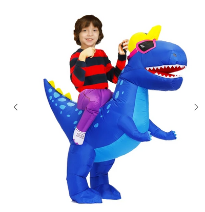 Young boy in an inflatable blue dinosaur costume with a yellow cap and pink goggles, next to a fan and battery pack. - Image 6