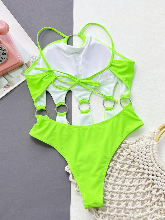 Neon green one-piece swimsuit with a halter neck, large O-ring, and side cut-outs with smaller O-rings. - Image 6
