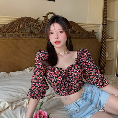 Blusa Floral con Escote Strappy y Hombros Descubiertos - Image 9