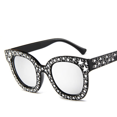 Black cat-eye sunglasses for ladies, featuring silver star embellishments on the frames and temples. - Image 9