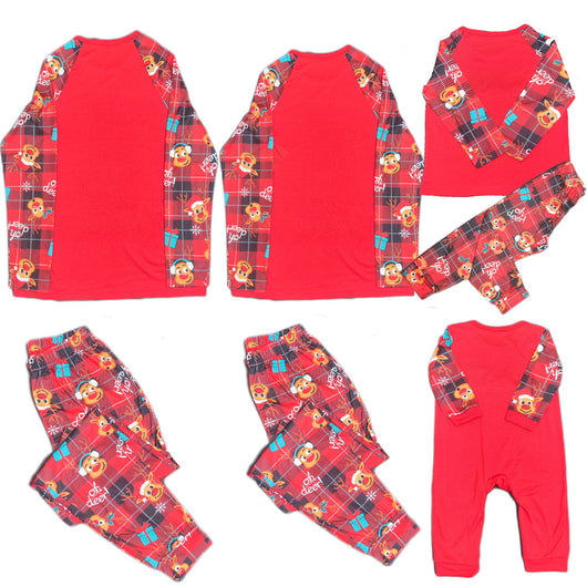 Family matching red Christmas pajamas with a cartoon reindeer and "Merry Christmas" text on a plaid background. - Image 11