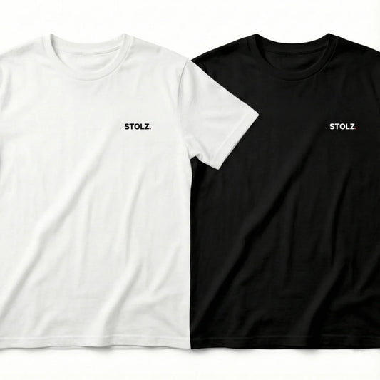 Two loose-fitting short-sleeve t-shirts, one white and one black, both with 'STOLZ' text on the chest.