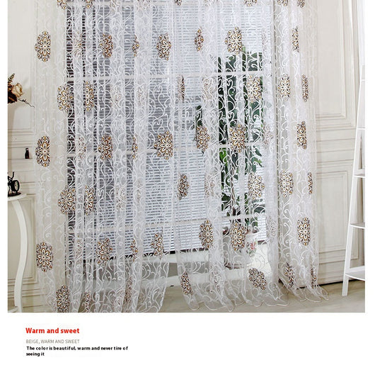 Sheer white European-style floral curtain with brown and gold patterns, hung on a gold rod in a bedroom. - Image 12