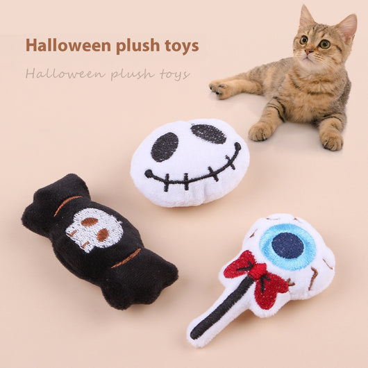 Plush cat teaser shaped like an eyeball lollipop with a blue iris, black pupil, and red bow.