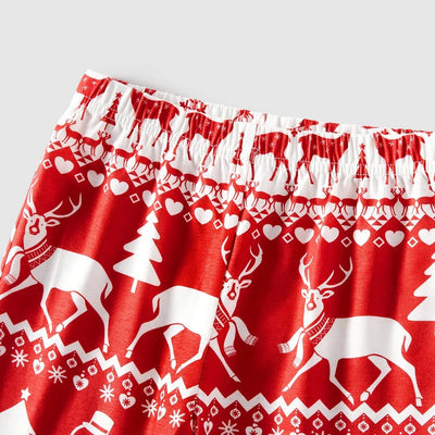 Red and white matching family Christmas pajamas with cartoon reindeer, Christmas trees, and snowman patterns. - Image 15