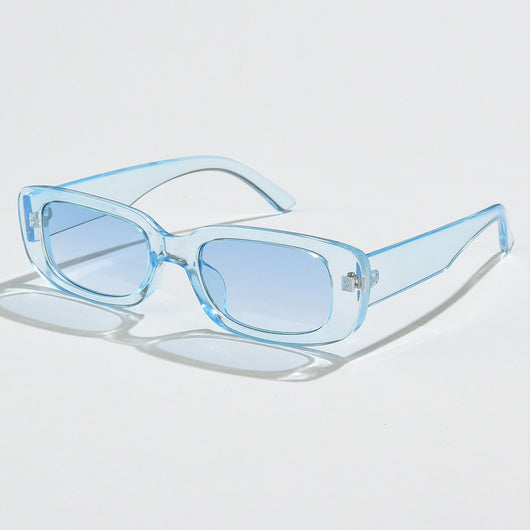 Rectangular tortoiseshell sunglasses with a small frame and dark gray lenses, angled on a white background. - Image 4