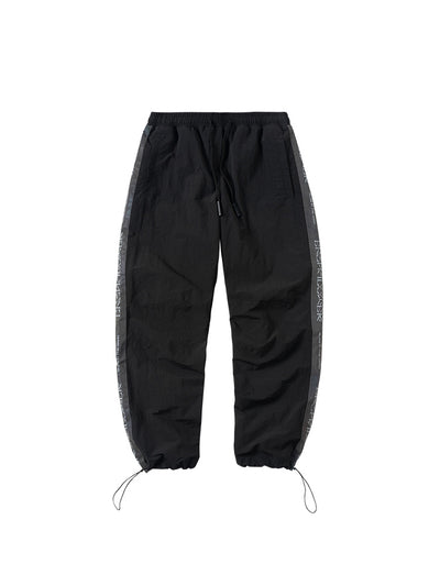 Pantalones Deportivos Reflectantes con Cordón - Diseño Suelto y Moderno - Image 8