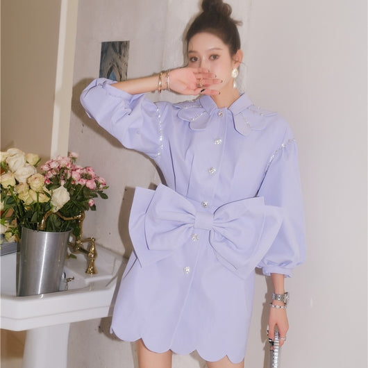 Vestido Abrigo Morado con Detalle Ondulado y Moño