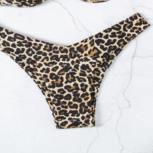 Women's two-piece leopard print swimsuit with a push-up bikini top and V-cut bikini bottom. - Image 13