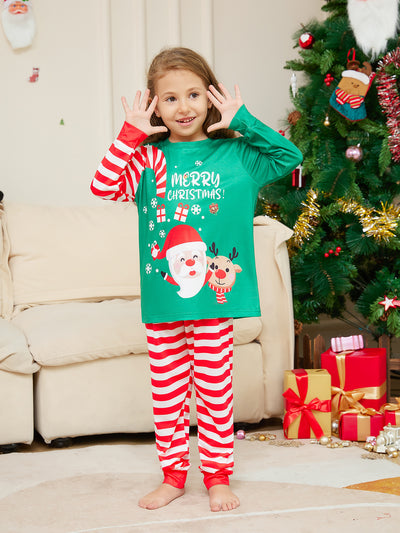 Family of four wearing matching green Christmas pajamas with Santa, reindeer, and red striped pants. - Image 9