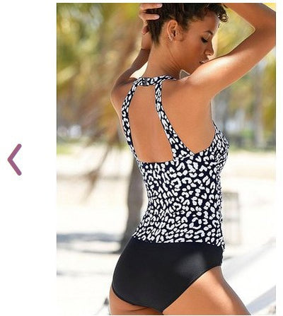 Woman in a black and white leopard print one-piece swimsuit with a halter neck and black bottoms, wearing sunglasses. - Image 9