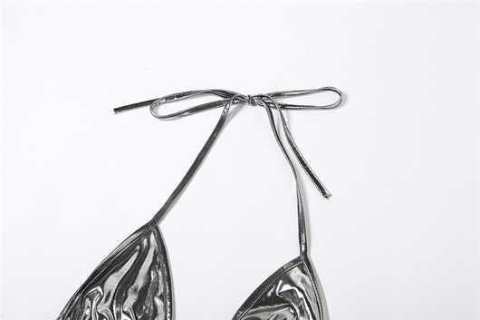 Purple reflective two-piece bikini with a halter neck top and tie-side bottoms, featuring a shiny solid color fabric. - Image 22
