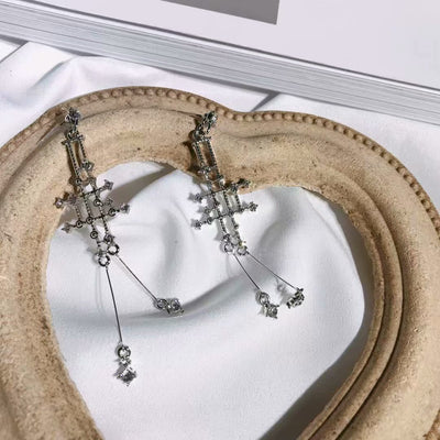 Aretes de Plata con Líneas Geométricas Cruzadas - Diseño Minimalista Versátil - Image 6