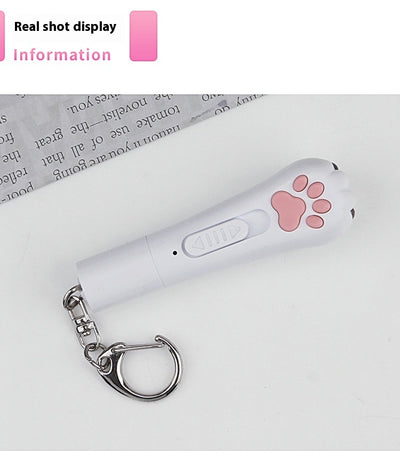 Light purple paw-shaped cat laser pointer toy with USB charging, featuring multiple red laser patterns, soft white light, and UV light. - Image 20