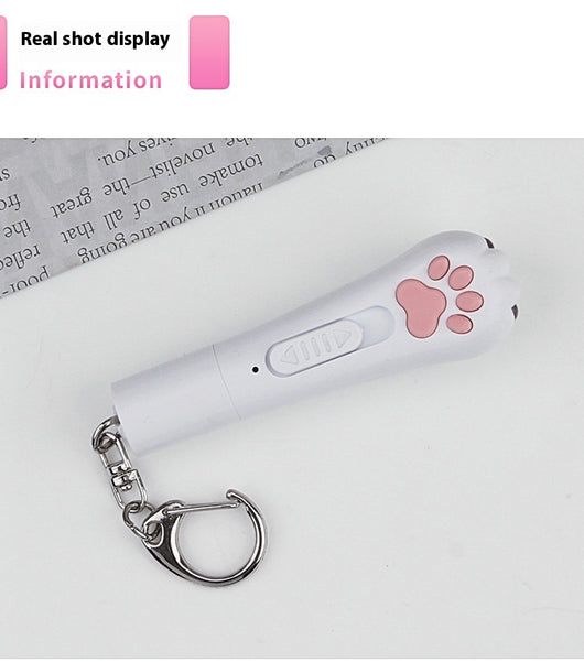 Light purple paw-shaped cat laser pointer toy with USB charging, featuring multiple red laser patterns, soft white light, and UV light. - Image 20