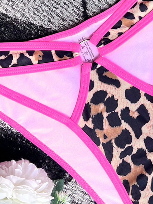 Women's hot pink and leopard print bikini with triangle top and strappy high-cut bottom, poolside. - Image 5