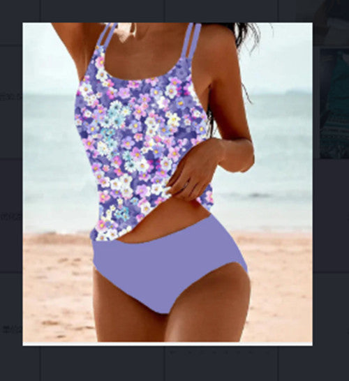Woman wearing a red retro split high waist tankini swimsuit with an ornate mandala print top on a beach. - Image 13