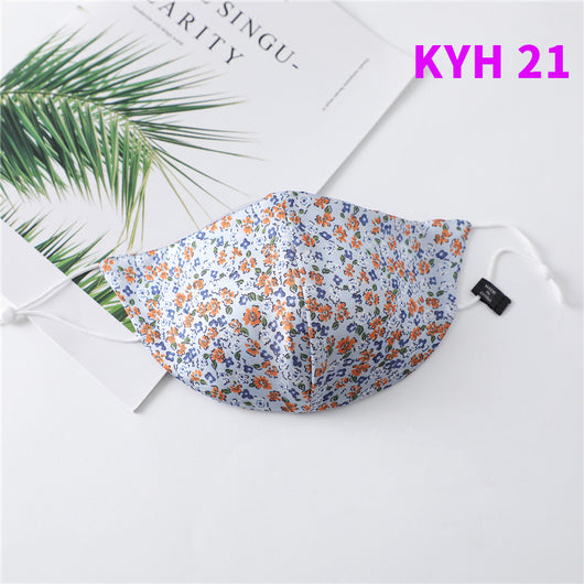White silk face mask with light blue floral pattern and adjustable ear loops for women's sun protection. - Image 22
