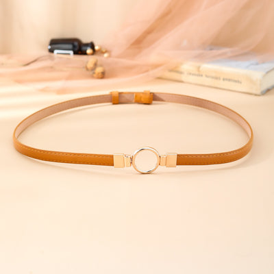 Black imitation leather belt with a glossy finish and a gold-tone round double buckle. - Image 4