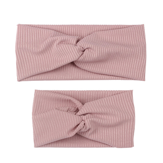 Matching dusty rose ribbed knit headbands with a twisted knot, one for an adult and one for a child. - Image 24