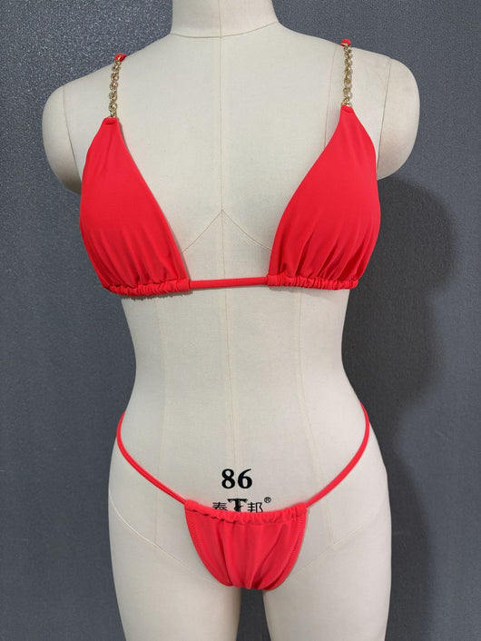 White three-point bikini with gold chain straps on a mannequin, featuring a triangle top and thong bottom. - Image 23