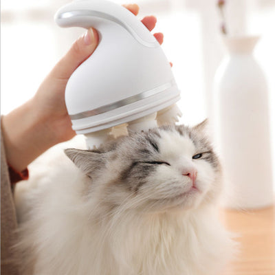 White electric pet head massager with silver accents, featuring a curved handle for comfortable grip. - Image 4