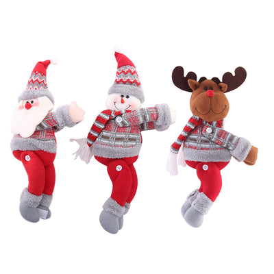 Plush Santa Claus curtain tie-back with a red and grey knitted hat, white beard, and red body, holding a golden curtain. - Image 3