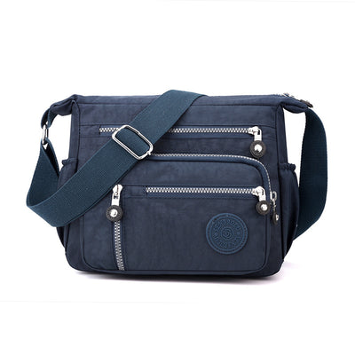 Bolsa Mensajero de Hombro Grande con Capacidad Expandible para Viajes - Image 11