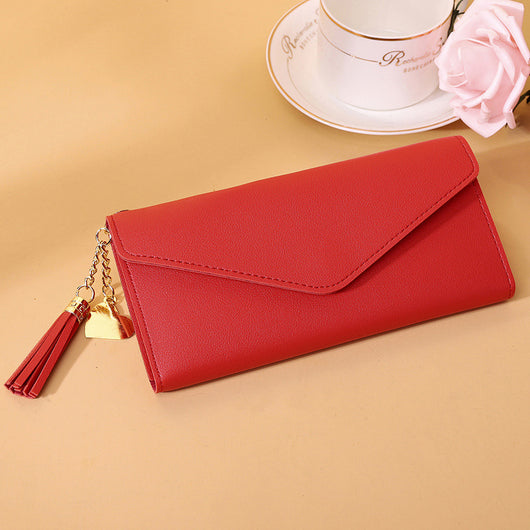 Bolso de mano con borlas decorativas - Image 13