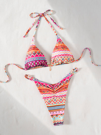 Vibrant geometric print triangle-bra bikini swimsuit with adjustable ties and high-cut ruched bottom. - Image 14